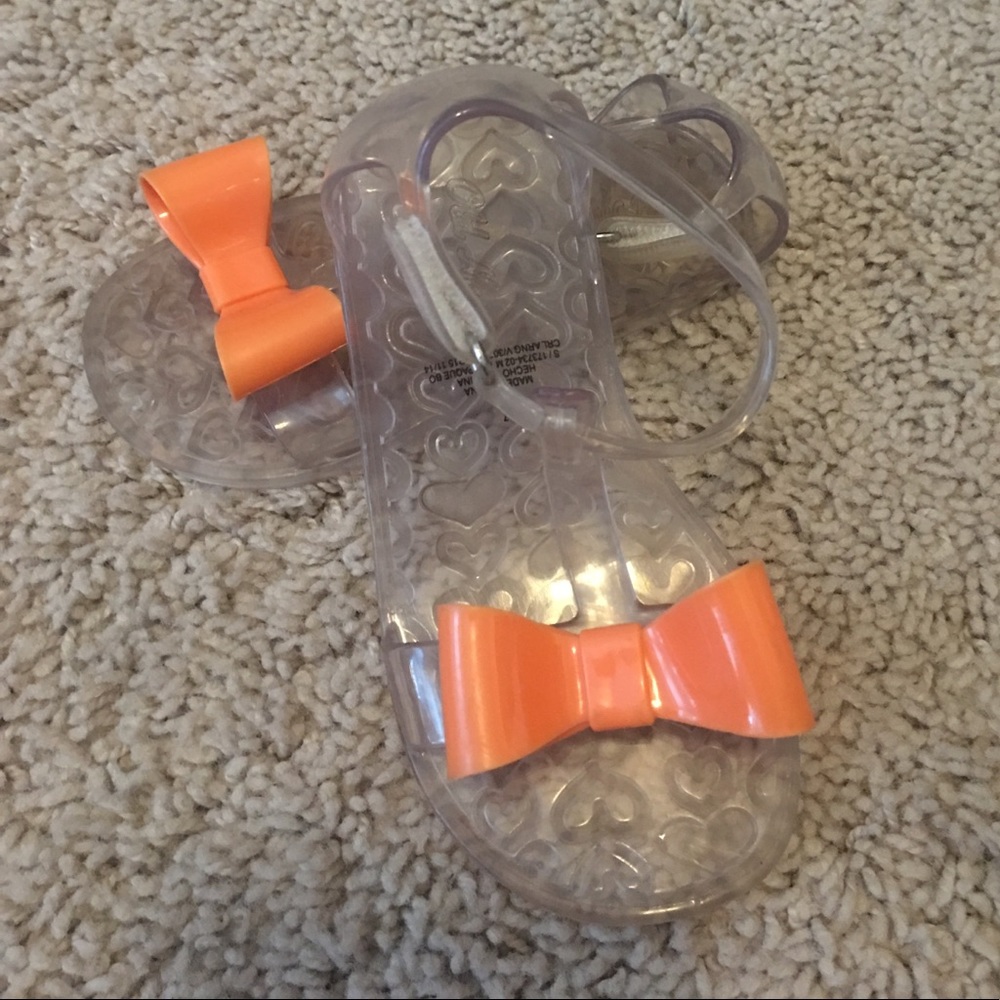 Clear and orange t-strap sandals